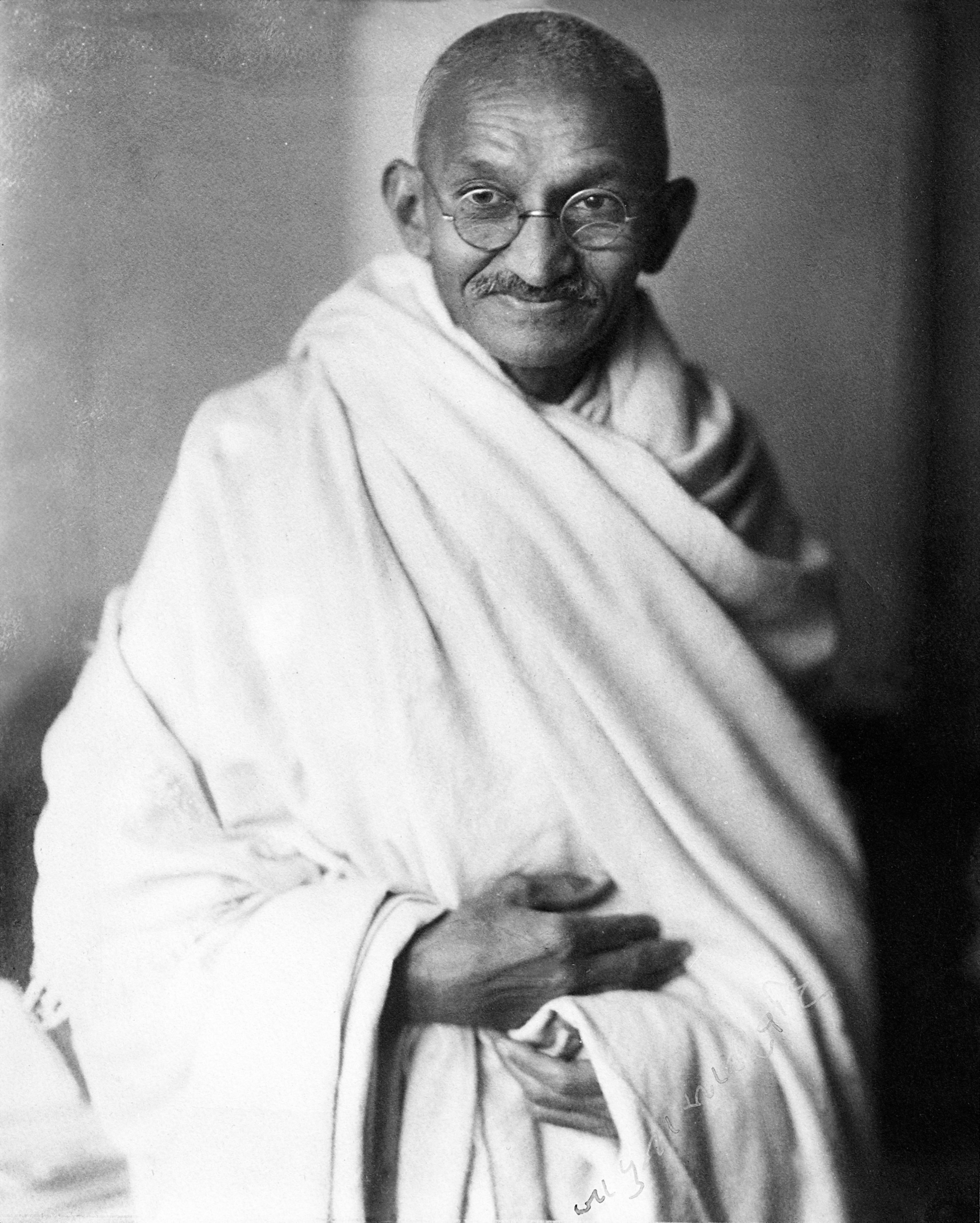 Mahatma Gandhi seated for a studio portrait in London, 1931
